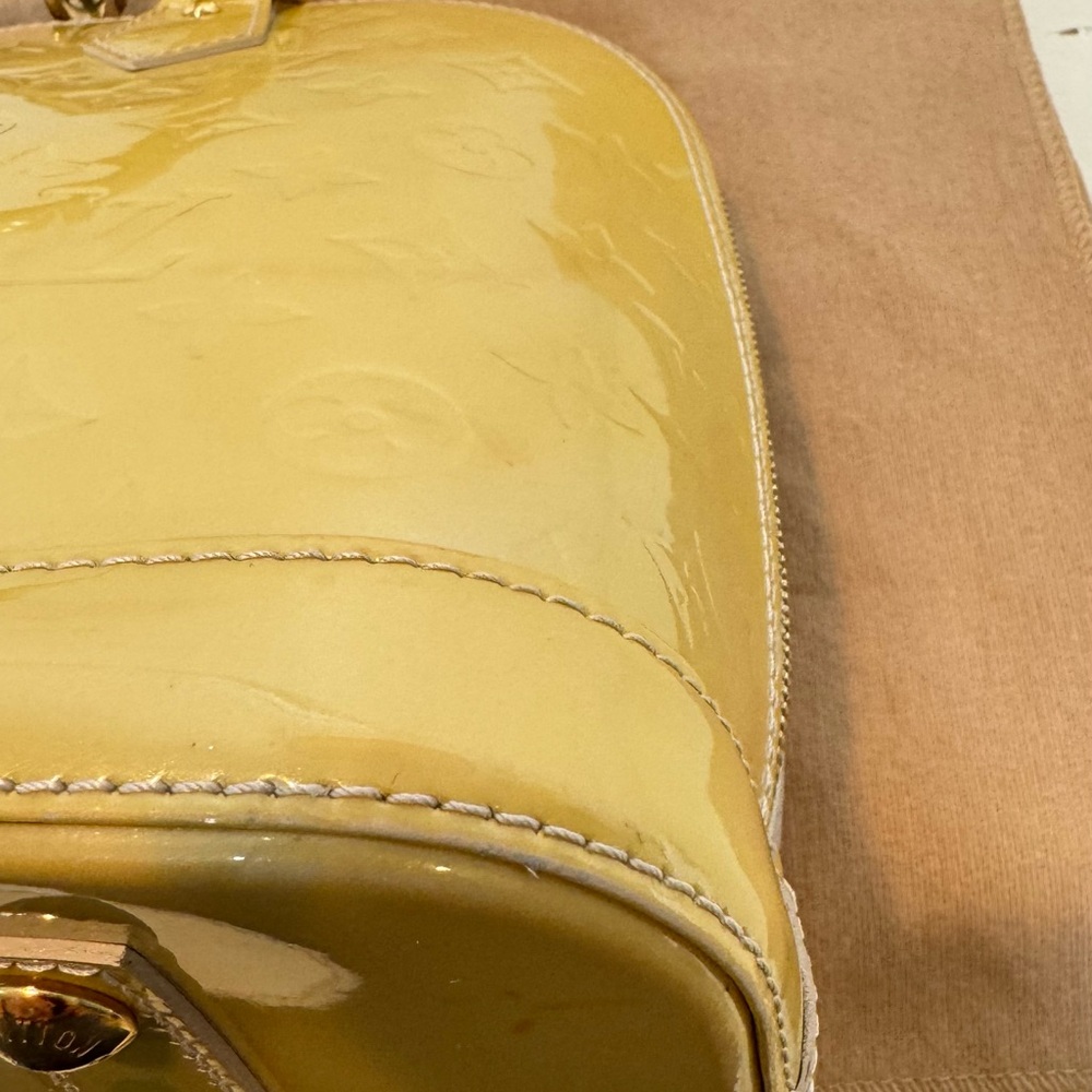 SOLD
Louis Vuitton Monogram Vernis Alma PM Satchel - Picture 8 of 14